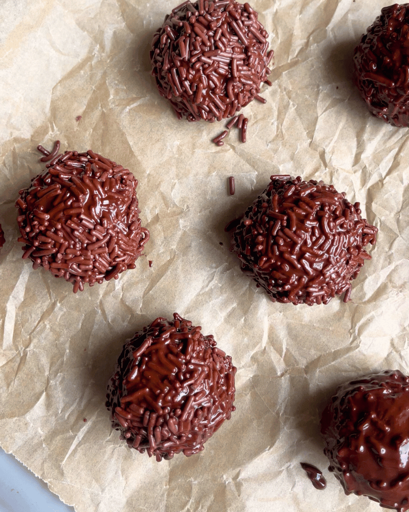 Chocolate Protein Truffles on a parchment paper