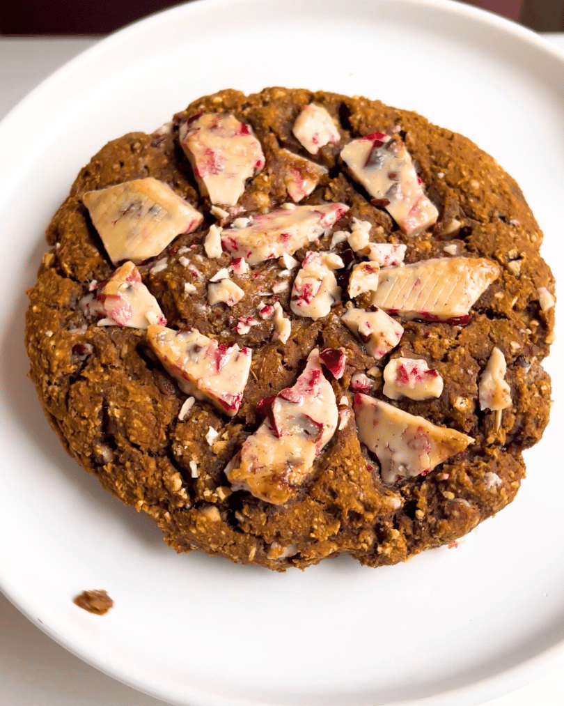 gingerbread white chocolate cookie on a white plate