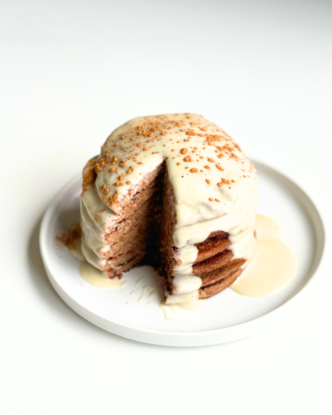 Cinnamon roll protein pancakes with cream cheese frosting