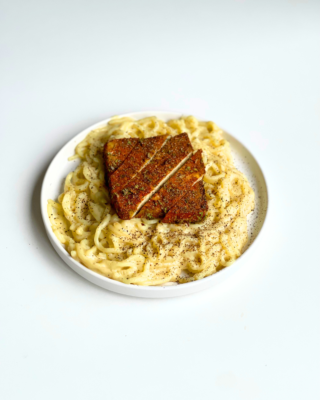 vegan alfredo pasta with blackened tofu