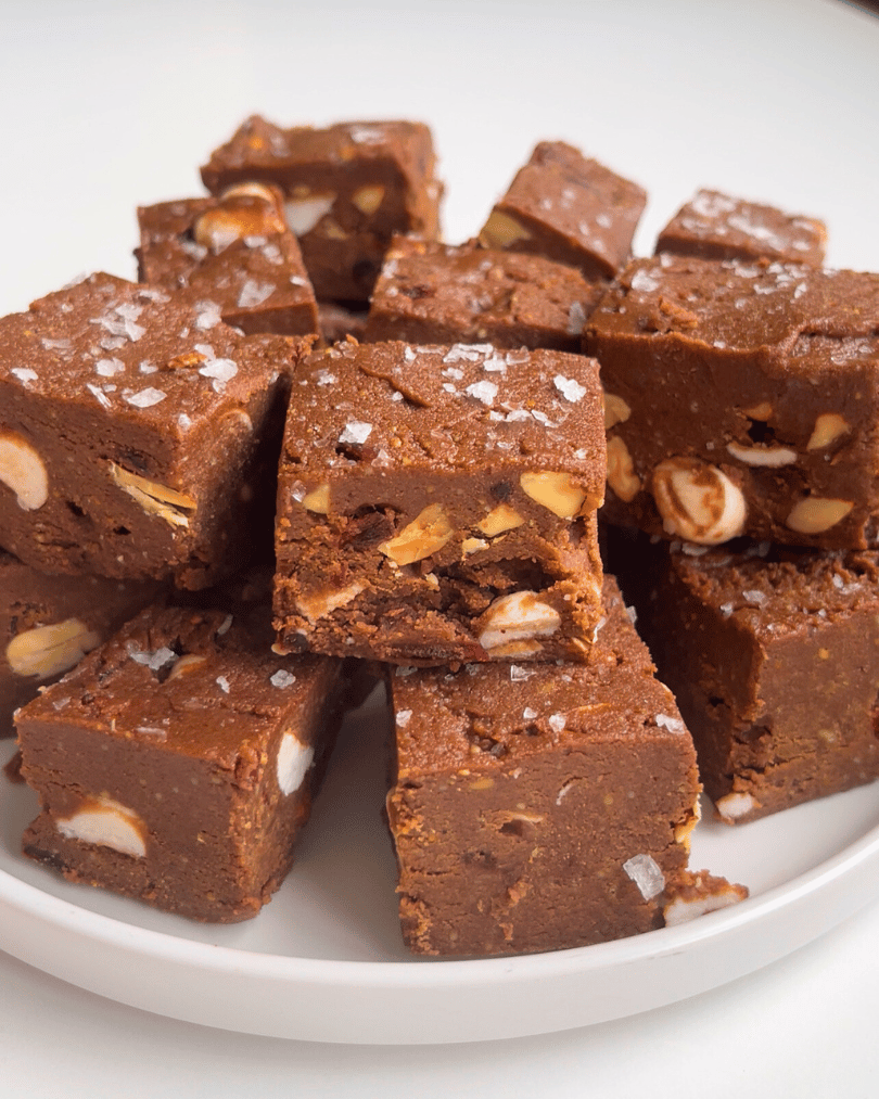 rocky road protein fudge squares on a white plate