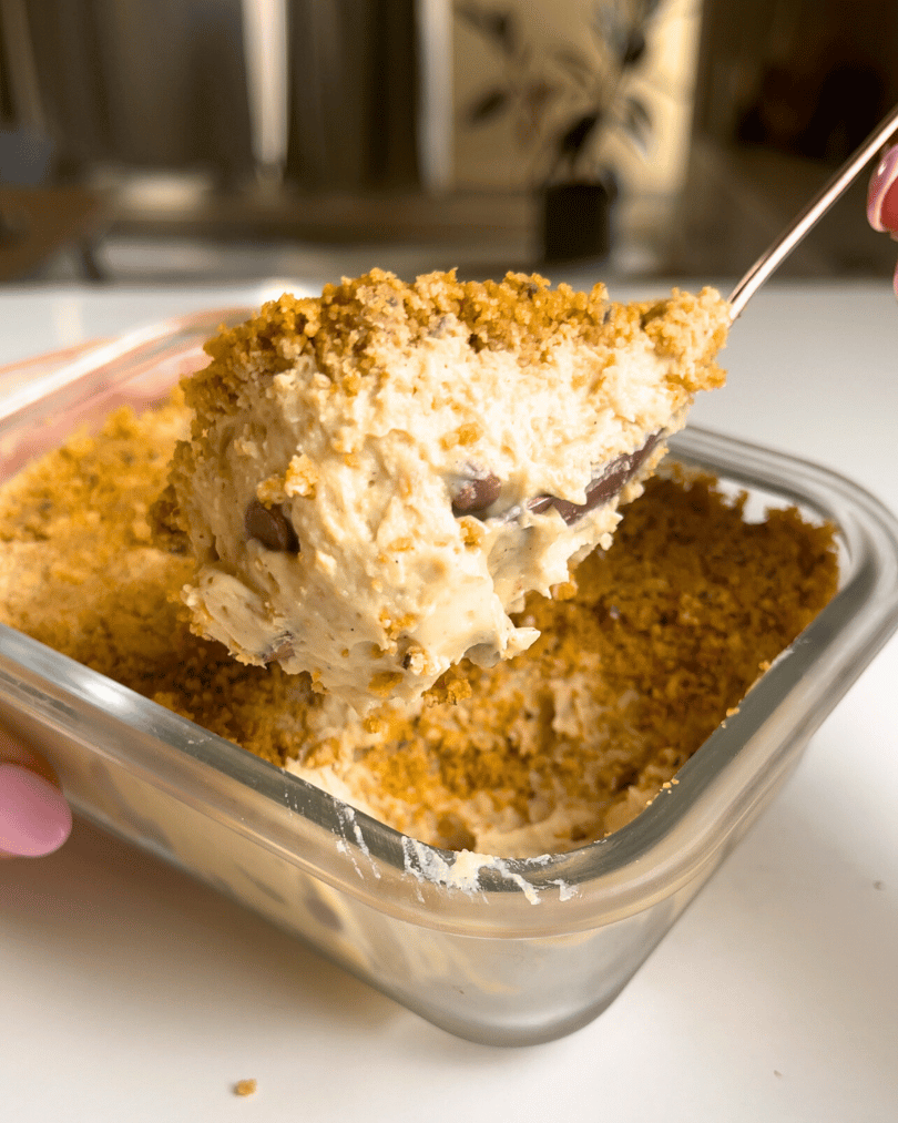 protein yogurt cookie dough cheesecake flavour in a glass meal prep container