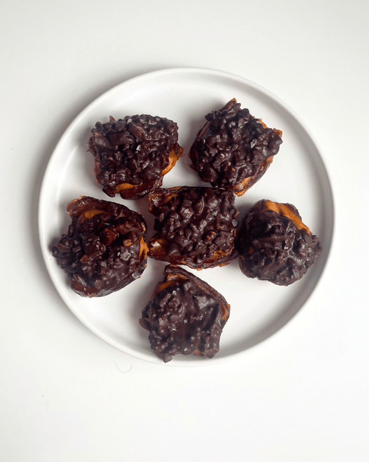 stuffed dates peanut butter chocolate on a plate