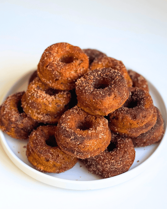 baked pumpkin donuts with cinnamon sugar