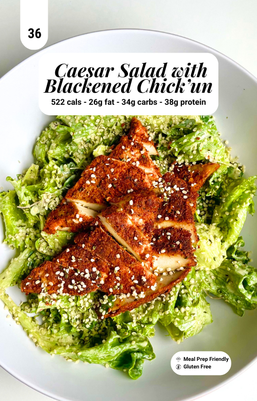 Caesar Salad with blackened vegan chicken on a white plate with macro information banner on top centre