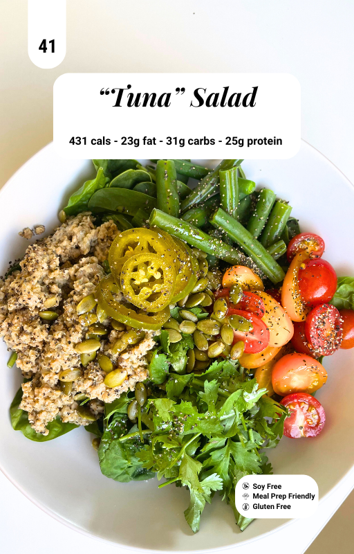 Tuna salad in a white plate with macro information banner on top centre