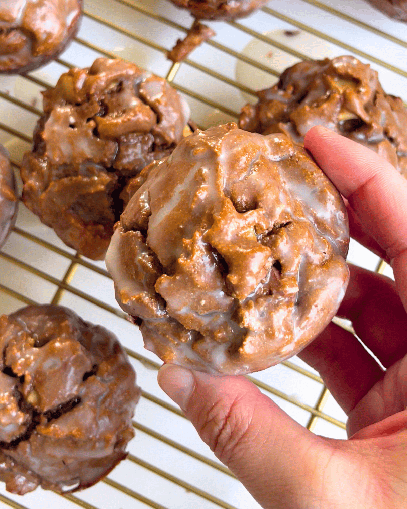 apple fritter protein muffins on a gold rack