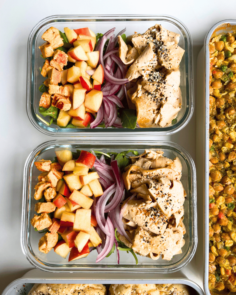 tofu turkey salads in glass meal prep containers