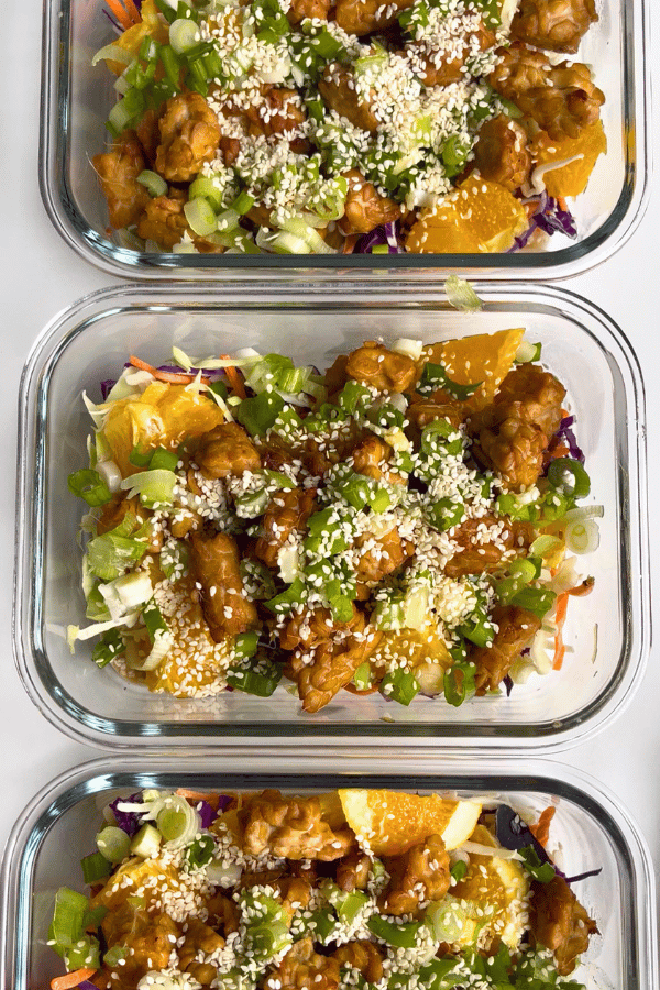 sesame ginger salad in glass meal prep containers