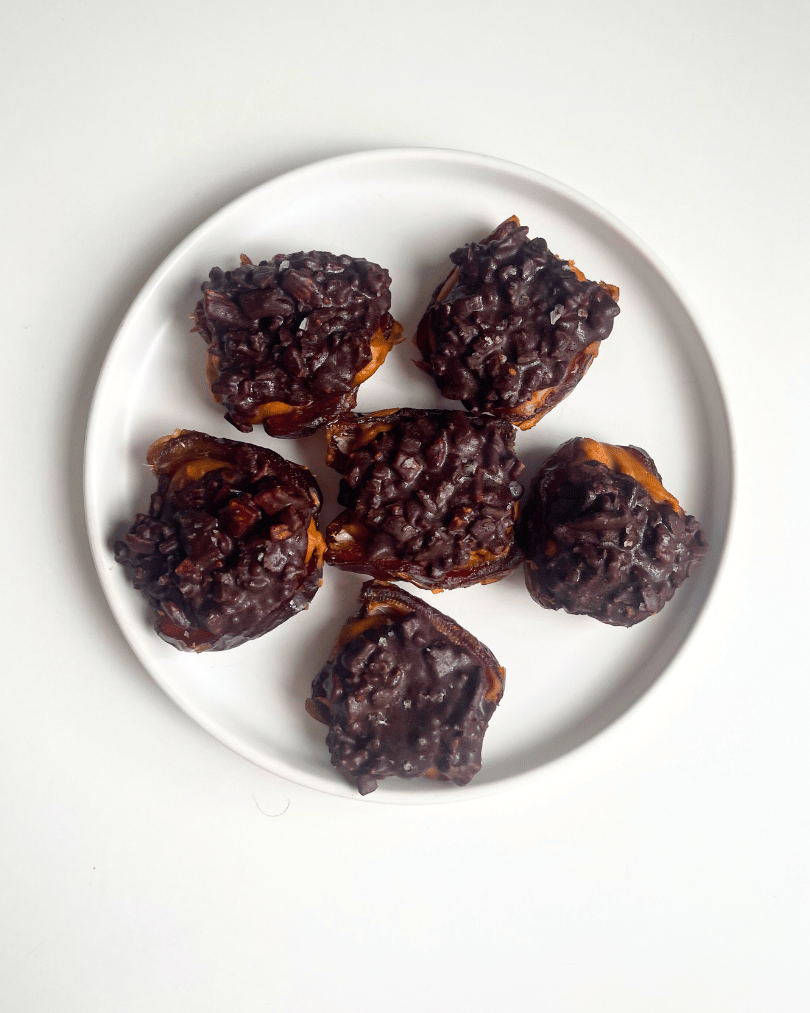 stuffed dates peanut butter chocolate on a plate