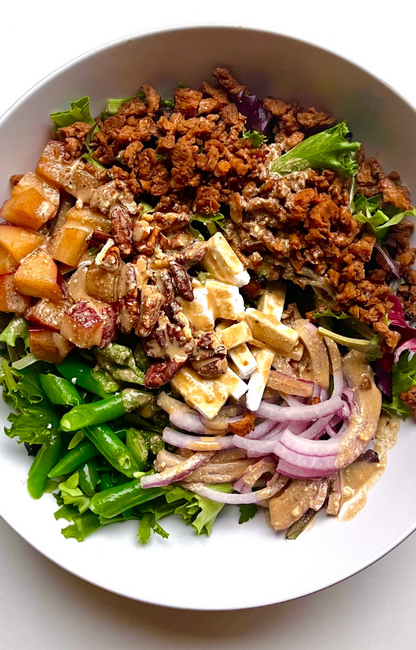 Balsamic Salad with Vegan Bacon on a white plate with a white background from the high protein vegan lunch recipes ebook